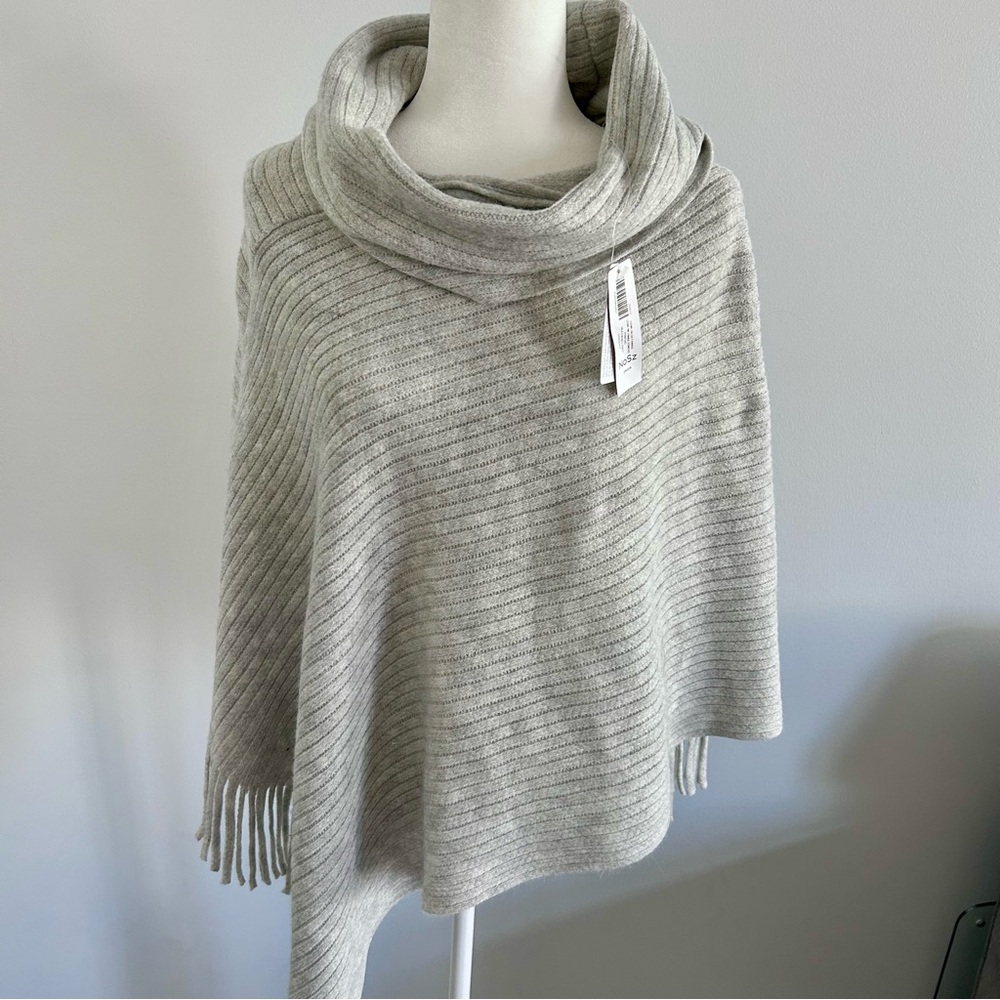 Chico’s Ladies Cowl Neck Fringe Poncho - One Size. New with tags.